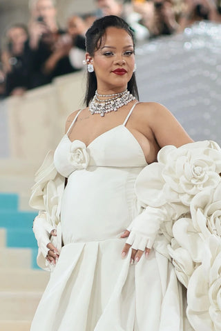 Rihanna flaunting pearl layered necklaces