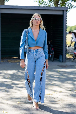 A model in a Polished Blouse and dressy Trousers