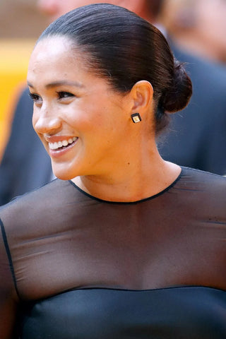Meghan Markle wearing classic stud earrings