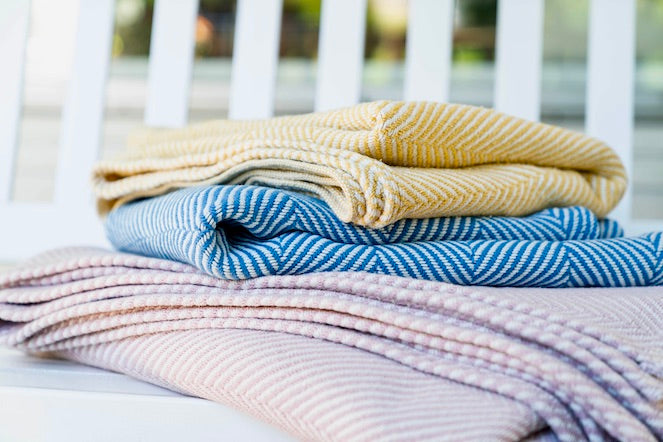 Authenticity50 Heritage Blankets in Prairie Yellow, Coastal Blue, and Desert Blush