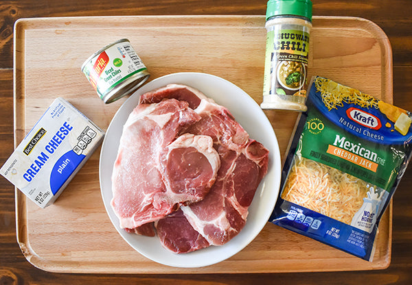 Ingredients for green chile pork chops, 8 oz cream cheese, chugwater chili green chili seasoning, 4 oz diced green chilies, shredded mexican cheese