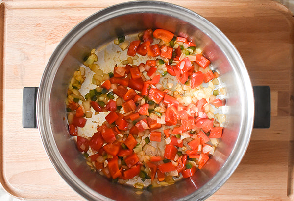 sauteed onion and peppers in pot