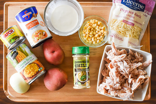 Ingredients for Green Chile Chicken and Corn Chowder on Cutting Board