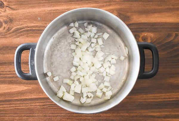 Onion in pot ready to saute