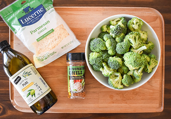 ingredients for parmesan roasted broccoli, broccoli florets, olive oil, parmesan cheese, chugwater chili dip & dressing mix