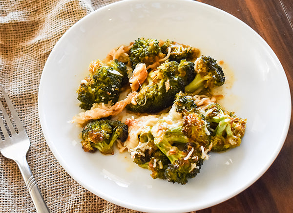 parmesan roasted broccoli on plate ready to eat