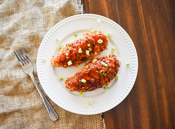 crispy sweet chili chicken tenders on plate ready to eat