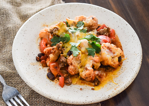 taco cauliflower bake on plate ready to eat