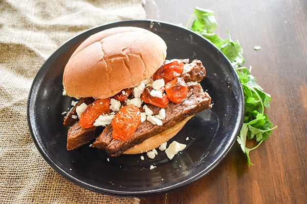 Flank Steak Sandwich with feta and roasted tomatoes