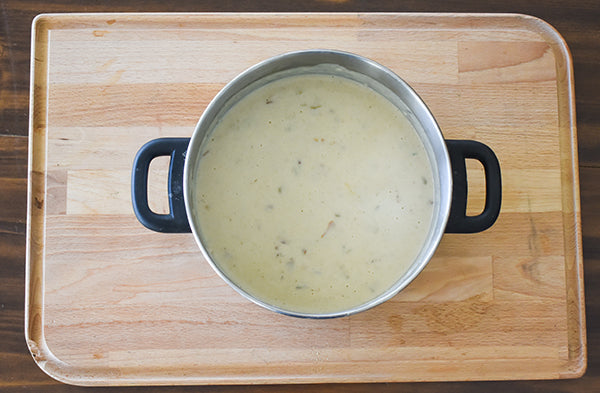 green chile bacon potato soup cooked until thickened