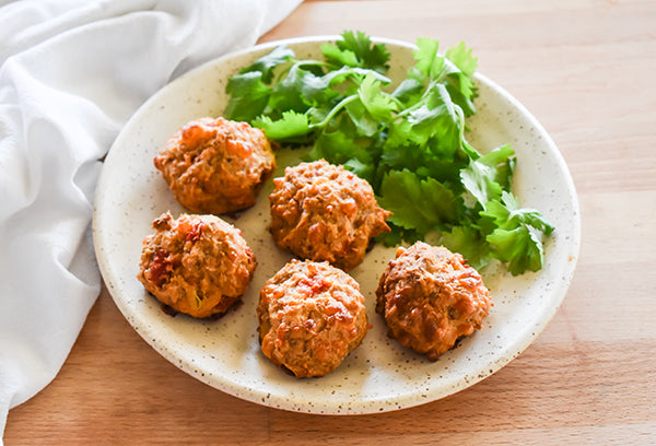 Spicy cream cheese sausage balls on plate ready to eat