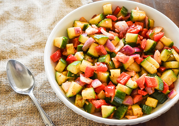 easy cucumber and red bell pepper salad in bowl ready to eat