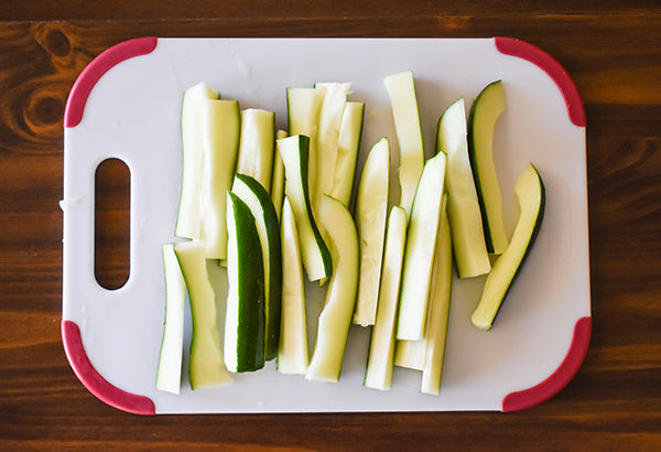 zucchini de seeded and sliced into strips