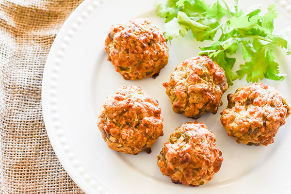 Cheesy Green Chile Sausage Balls on plate ready to eat