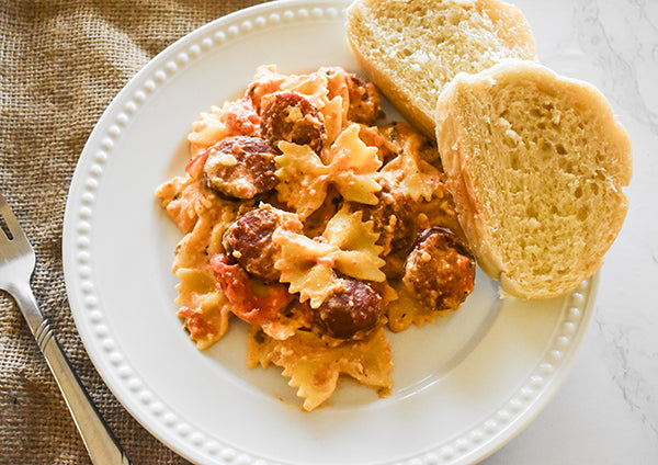 baked feta tomato pasta served with bread