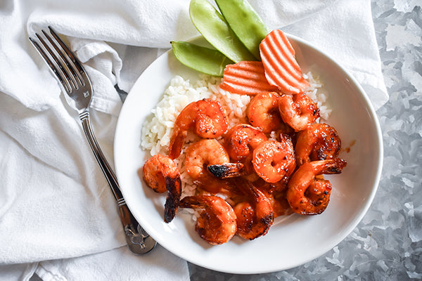 Shrimp on plate with red pepper jelly glaze