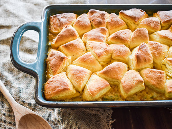 chicken and biscuit bubble up in casserole dish ready to be ate