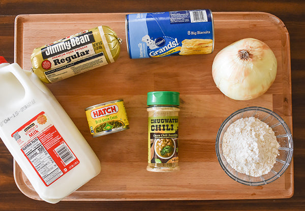 ingredients for creamy green chile biscuits and gravy sausage, diced green chilies, onion, milk, flour, chugwater chili green chile seasoning