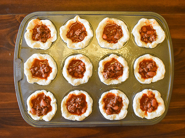 chugwater chili added to biscuit dough cups