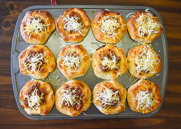 cheese added to chili cups