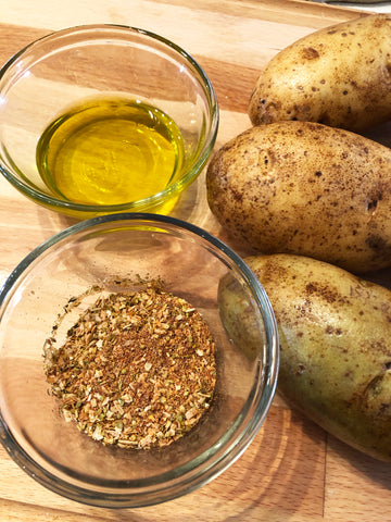 potatoes next to oil and seasoning