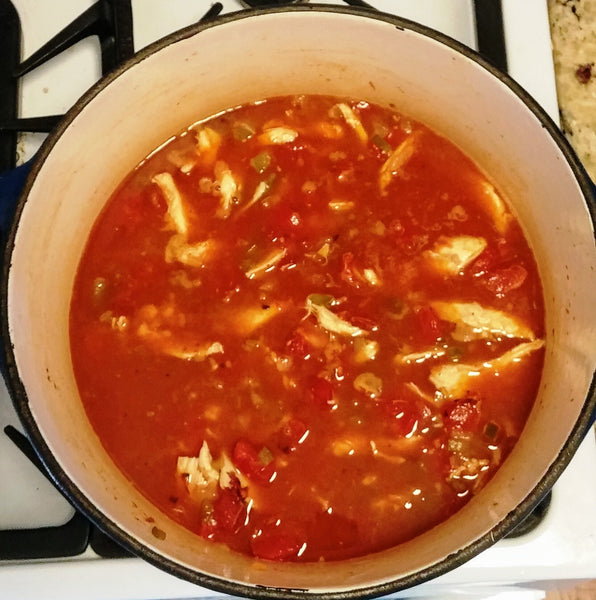 photo of the chicken tortilla soup simmering on the stove