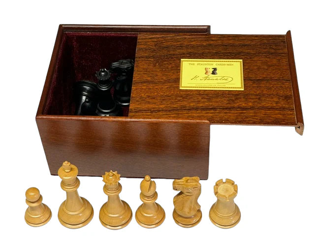 Elegant wooden chess set with a storage box and detailed pieces displayed.