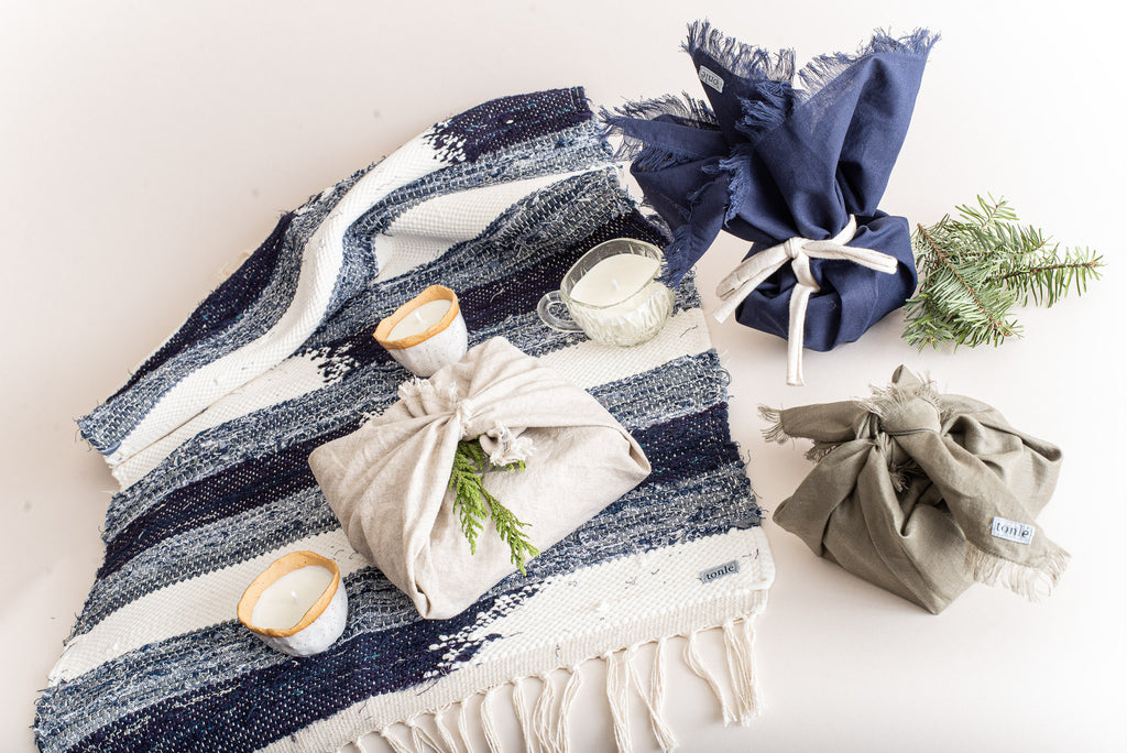 A selection of tonlé gift items with a blue theme zero waste gift wrapped 