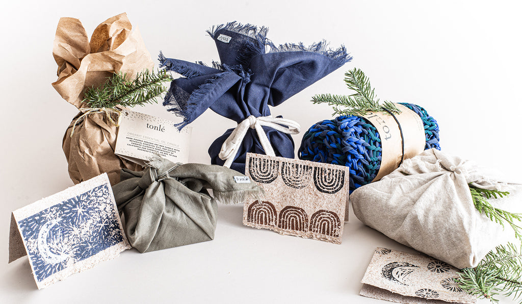 A collection of tonlé gift items in sustainable holiday gift wrap