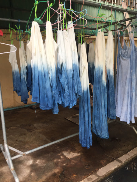 Naturally dyed indigo garment drying