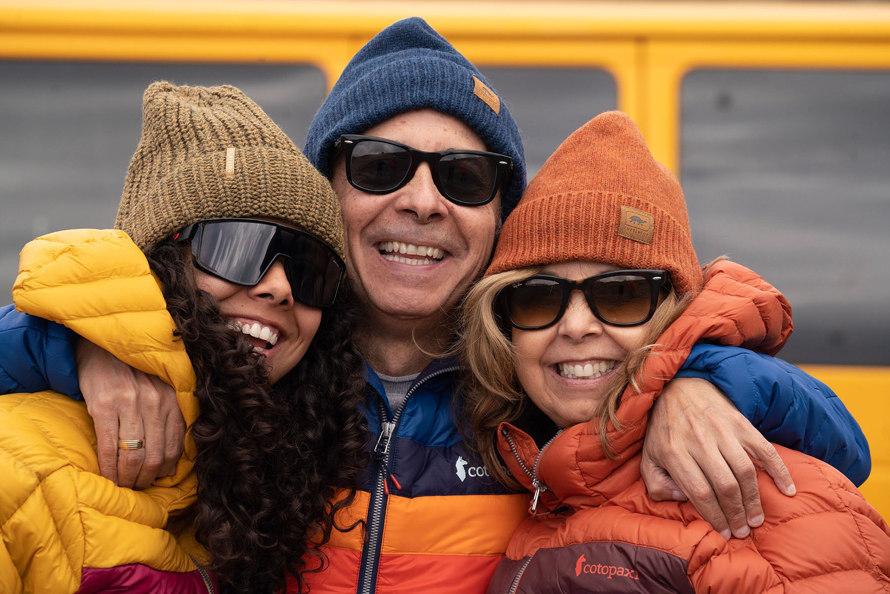 Vanessa poses with her parents for a photo