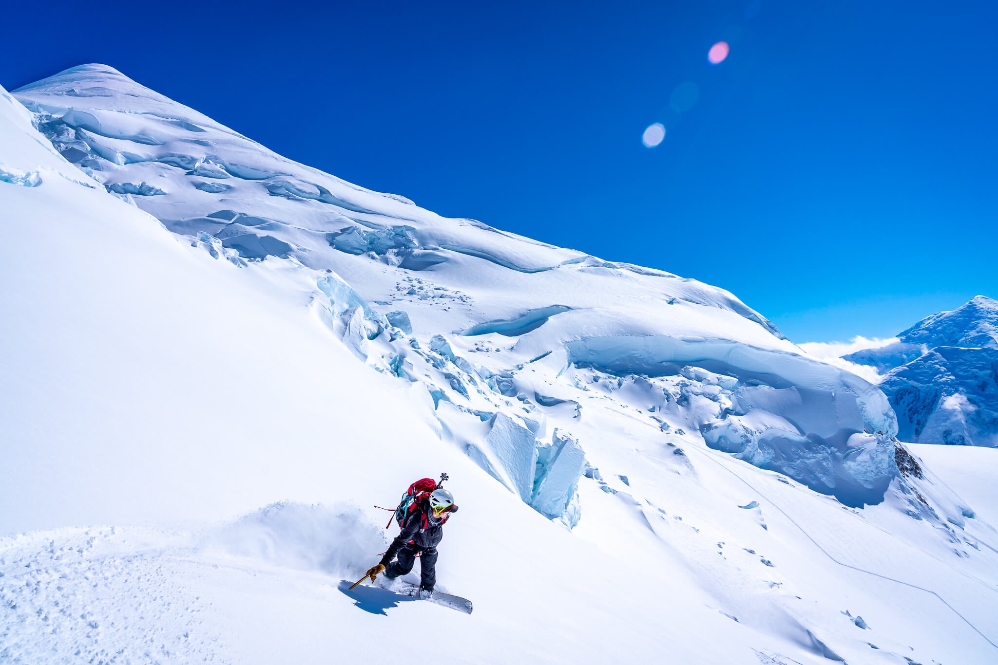 Joey Sackett arcs a turn in the pristine wilderness that is Denali National Park and Preserve