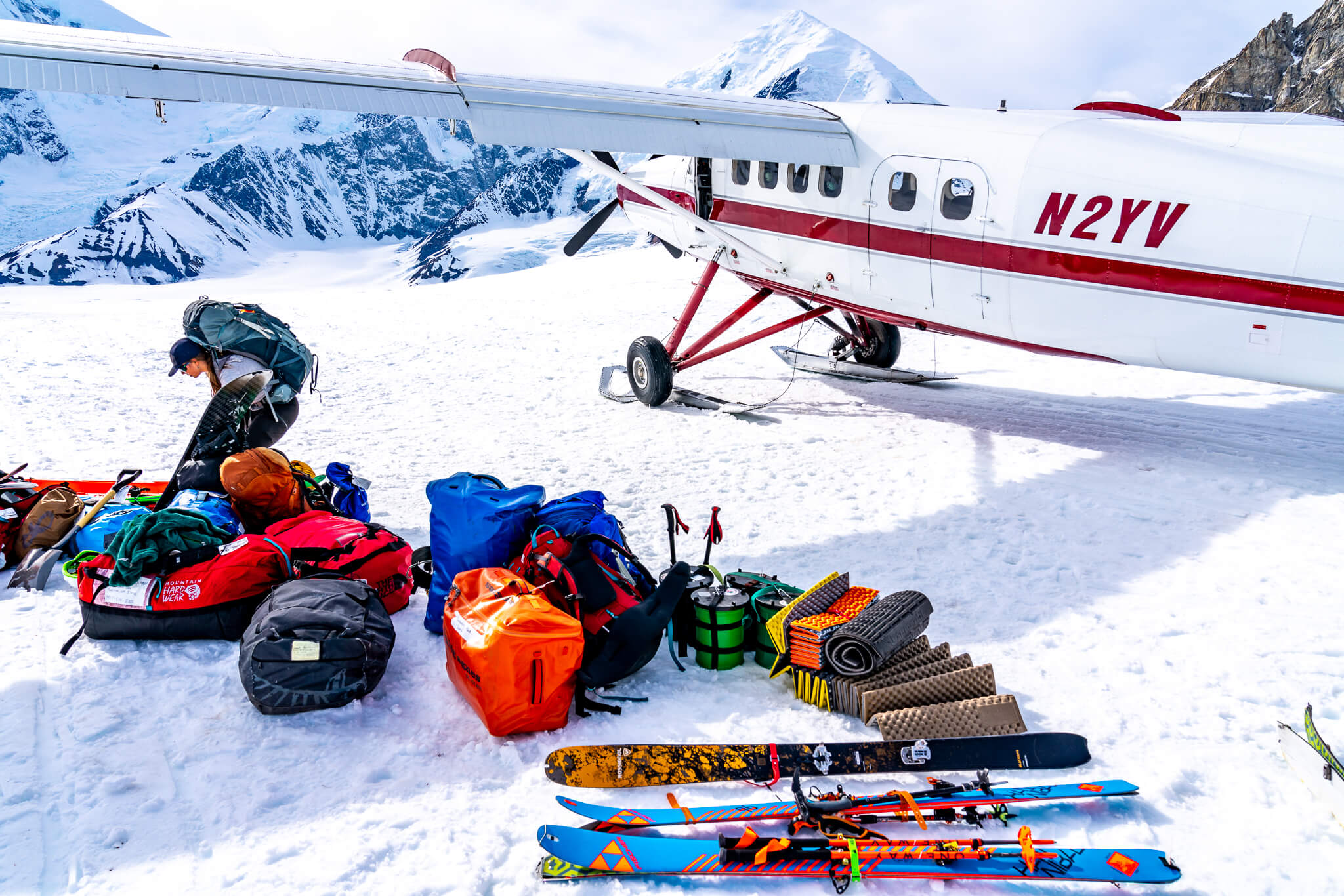 Disembarking from the plane with our gear at 7,200 feet on the Kahiltna Glacier