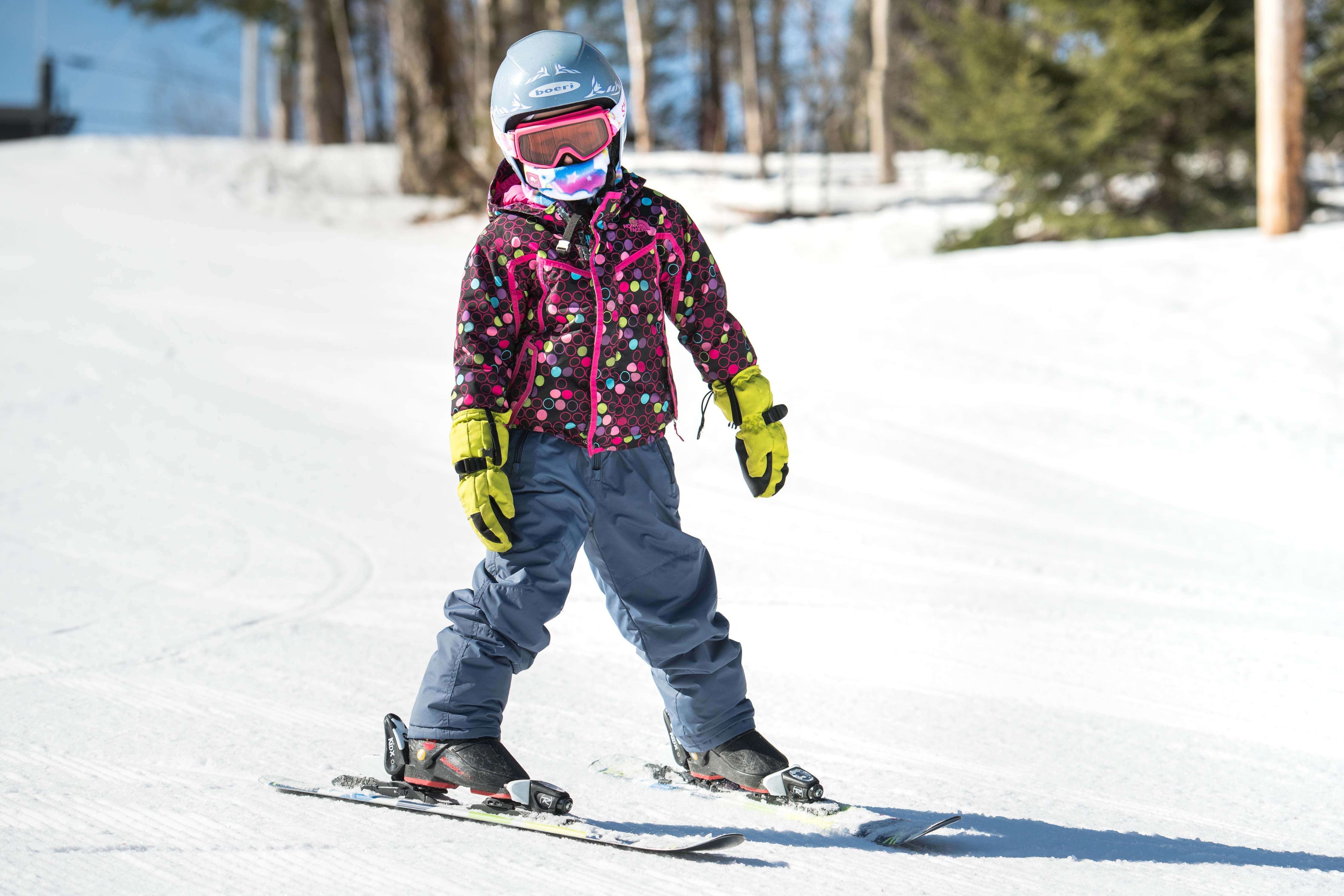 Child downhill skiing