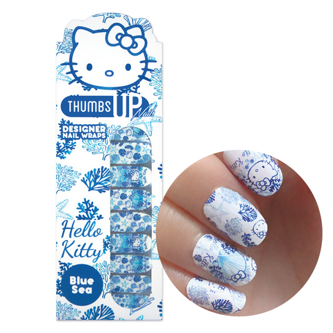 hello kitty nails with bow