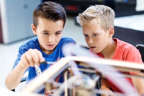 Students constructing a 3D printer