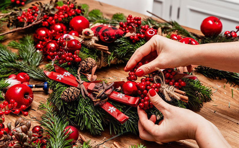 making wreath with cinnamon sticks