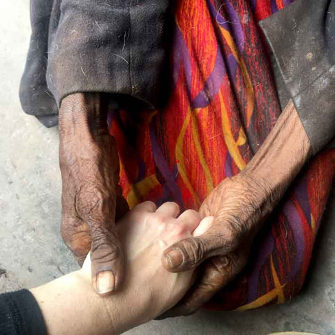 Kathleen Ngale holding hands