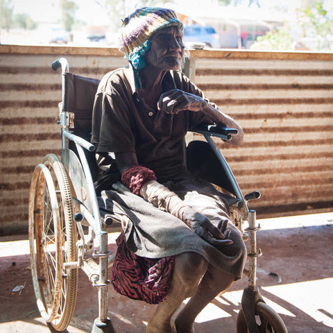 Kathleen Ngale sits in wheelchair unable to see