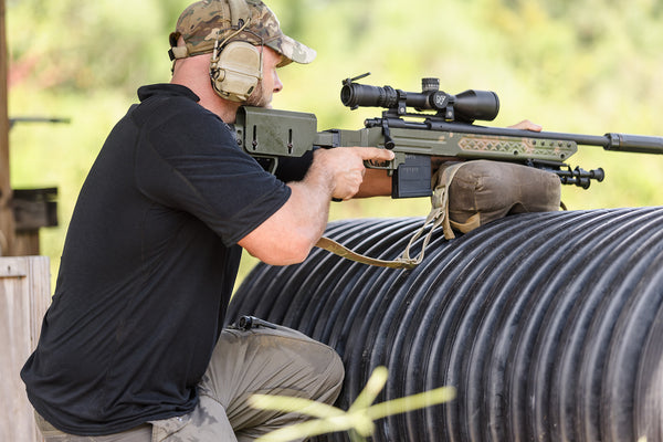 black assaulter shirt and sniper training