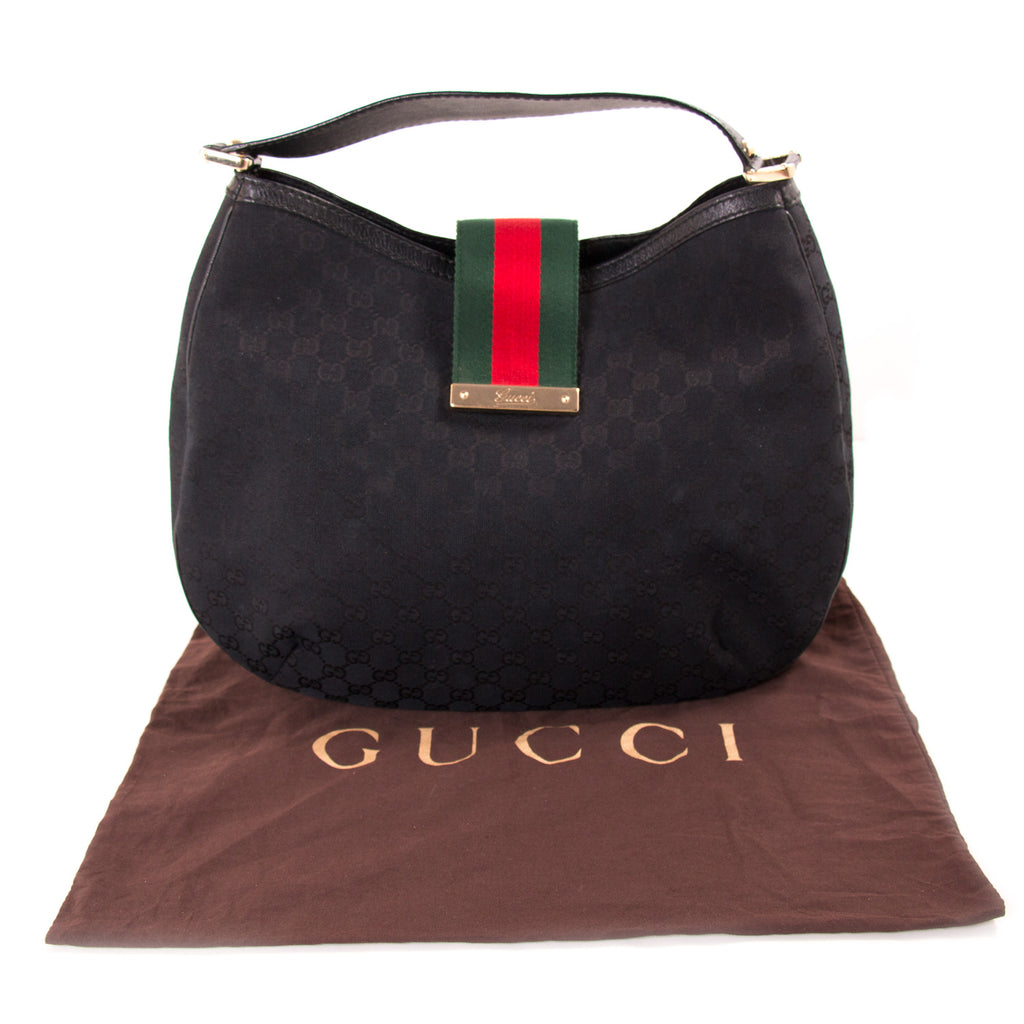 Shop authentic Gucci GG Black Canvas Hobo Bag at Re-Vogue for just USD 400.00