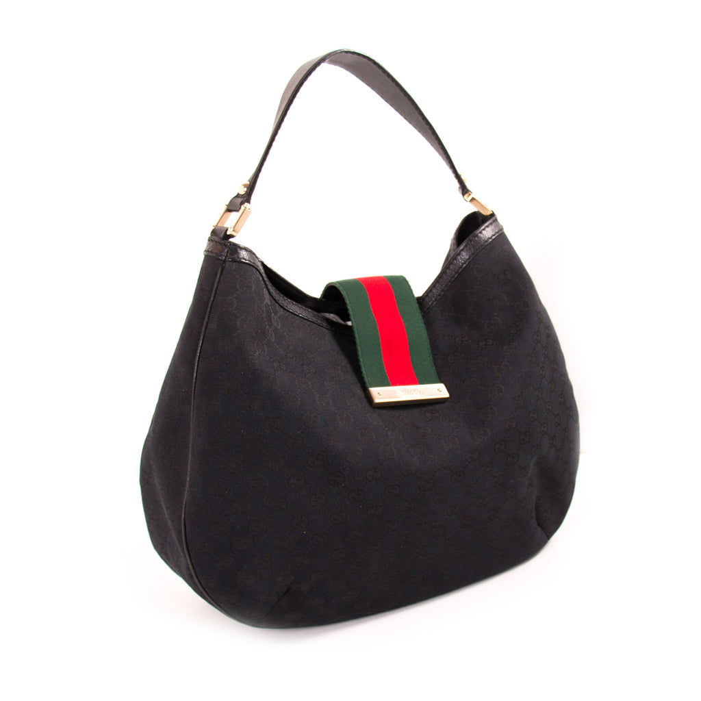 Shop authentic Gucci GG Black Canvas Hobo Bag at Re-Vogue for just USD 400.00