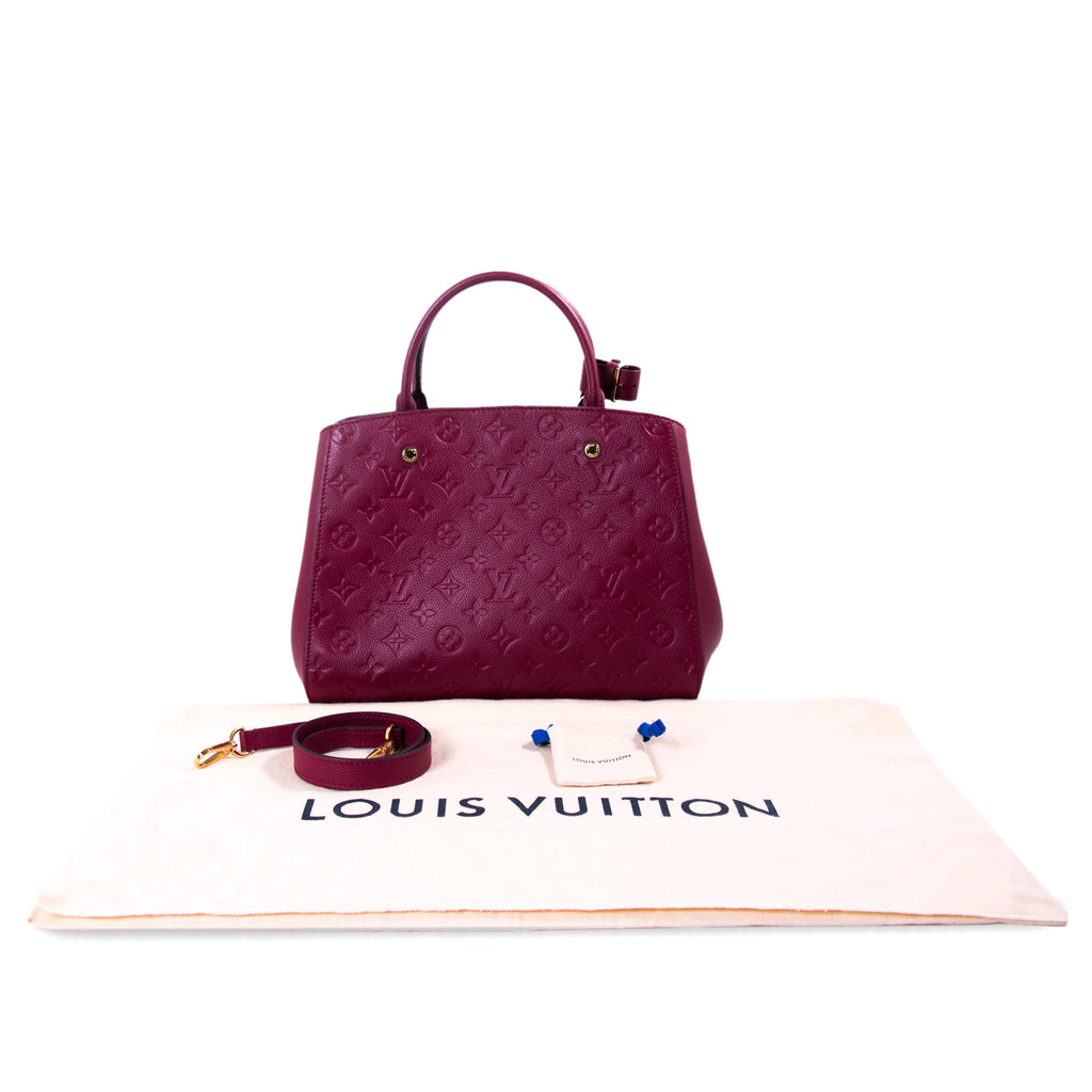 Shop authentic Louis Vuitton Monogram Empreinte Montaigne MM at revogue for just USD 2,400.00