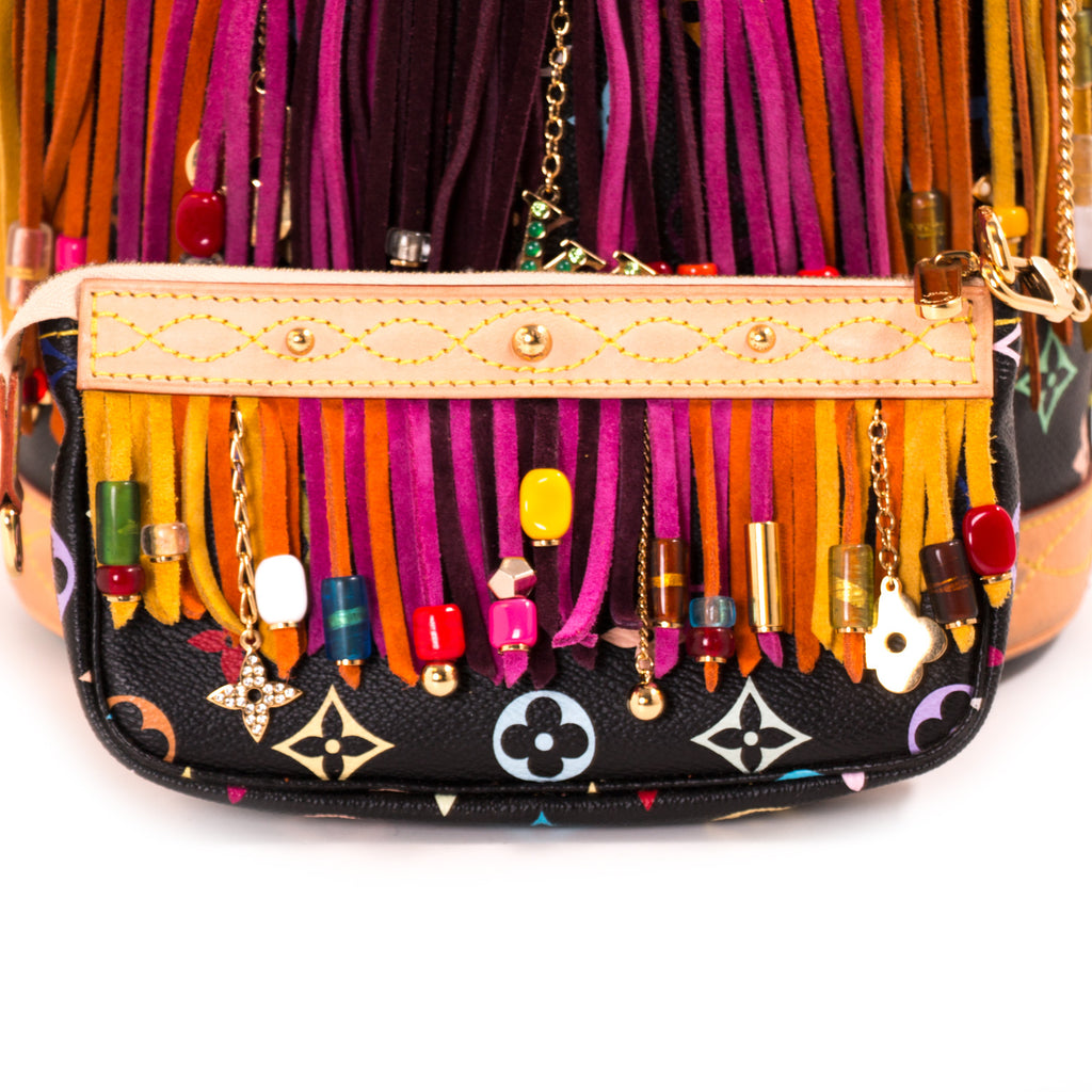 Shop authentic Louis Vuitton Multicolor Fringes Bucket Tote Bag at revogue for just USD 1,000.00