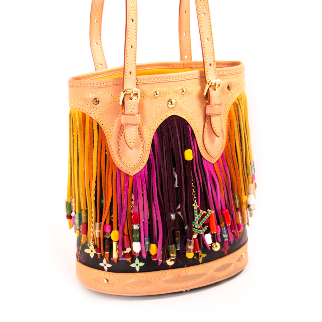 Shop authentic Louis Vuitton Multicolor Fringes Bucket Tote Bag at revogue for just USD 1,000.00