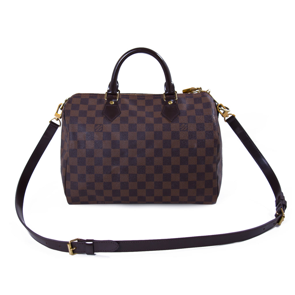 Shop authentic Louis Vuitton Damier Ebene Speedy 30 Bandouliere at revogue for just USD 800.00