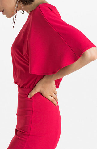 Red knee length dress with plunge neckline at the back; bandeau band accessories included. Patrizia Pepe available at our digital Boutique Affairedefemmes.net. 