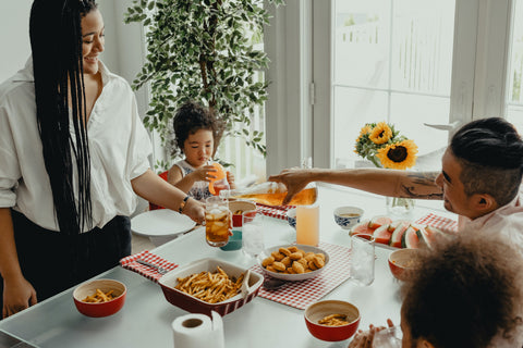 Family at dinner - Mainland Furniture NZ