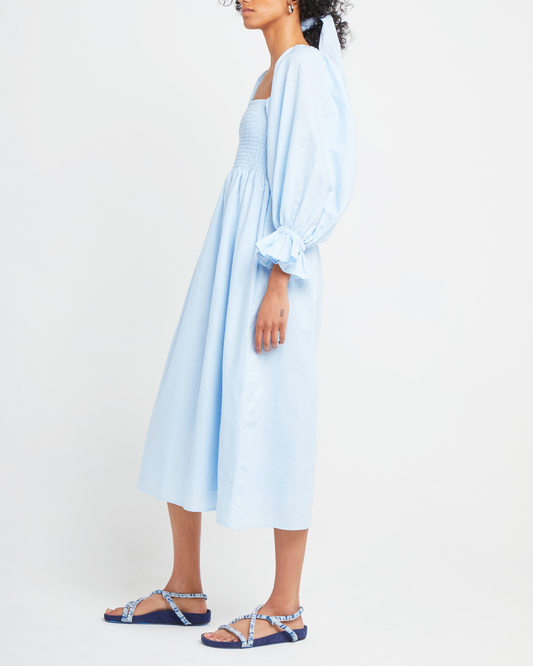 Second image of Athena Dress, a blue midi dress, off shoulder, long sleeve, puff sleeves, smocked