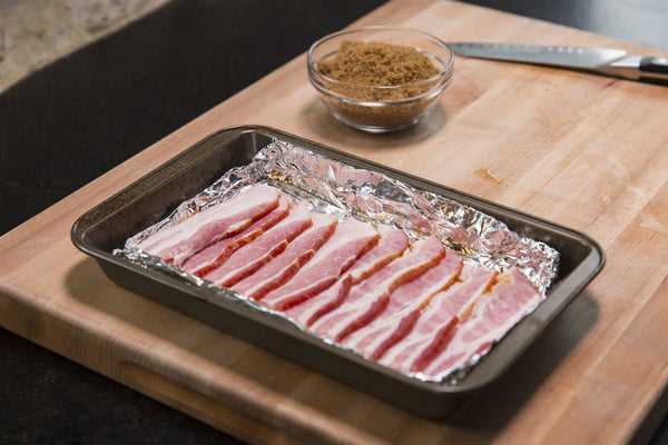 Hot Potato Salad: prepared bacon lying on a pan